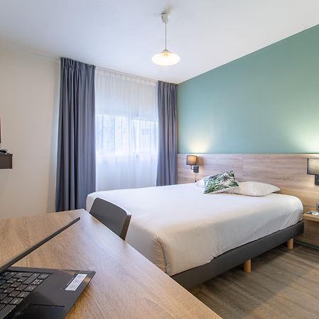 Zenitude Hôtel-Résidences Le Mans Novaxis Esterno foto