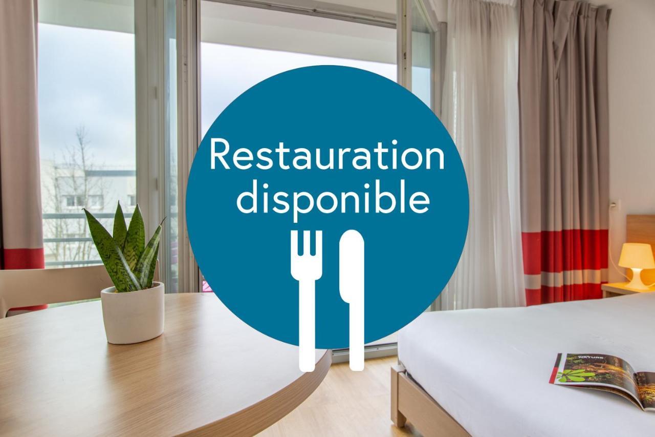 Zenitude Hôtel-Résidences Le Mans Novaxis Esterno foto