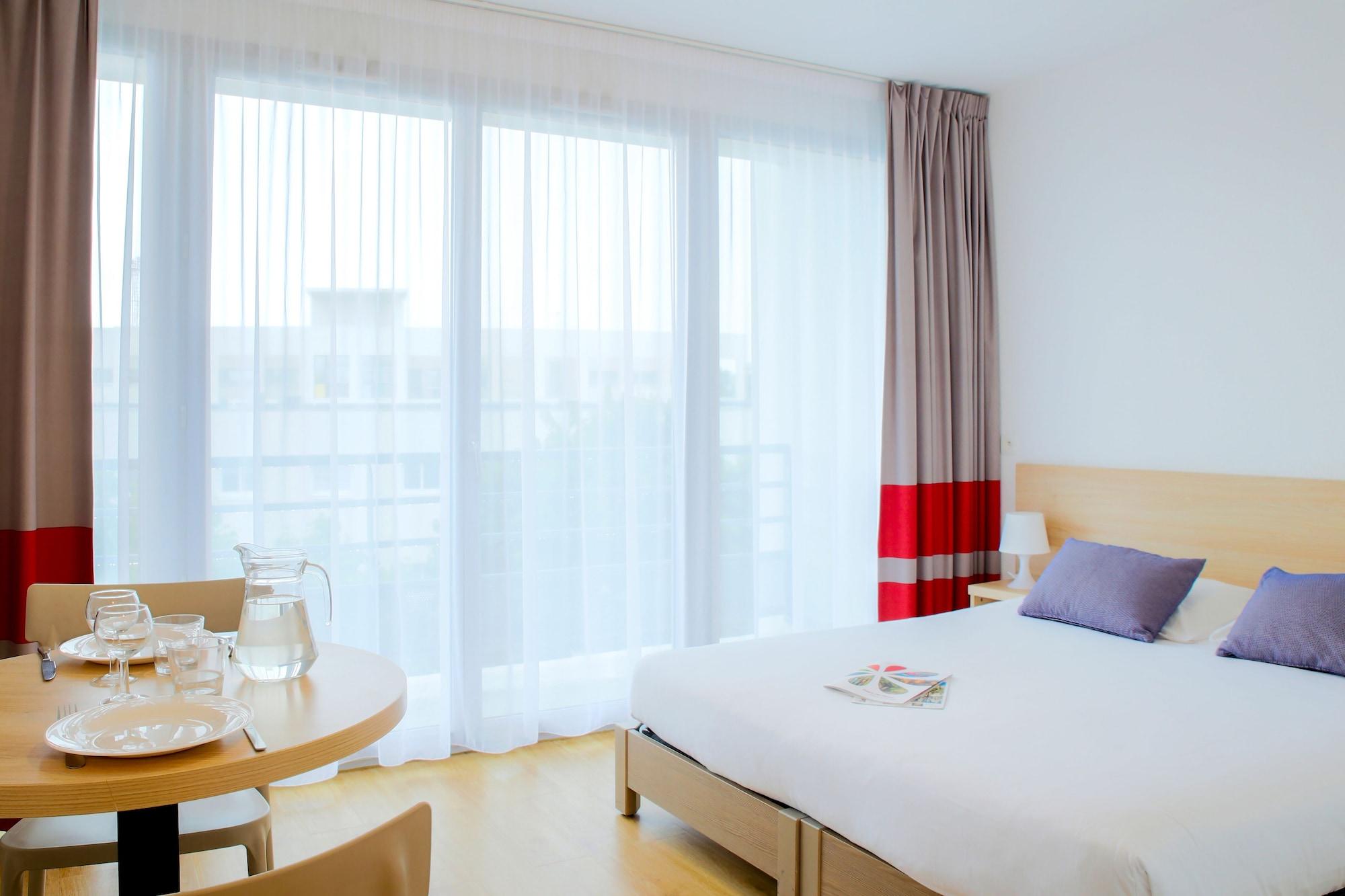 Zenitude Hôtel-Résidences Le Mans Novaxis Esterno foto